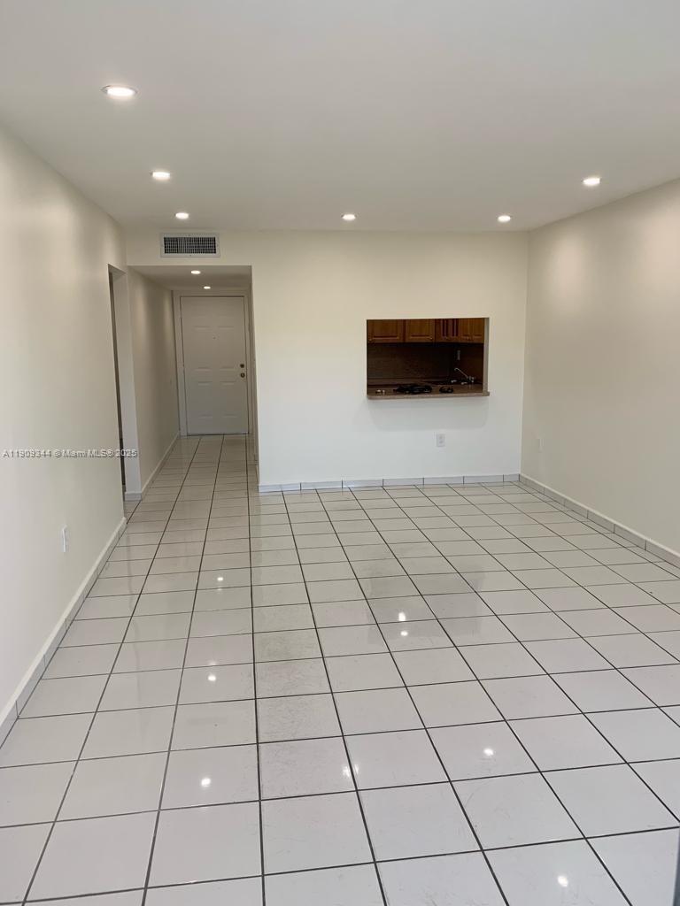 1555 West 44th Place, Unit 234 Hialeah, FL 33012 - Photo 10 of 38 a view of an empty room