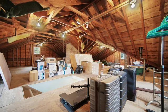 front view of a house with a bench