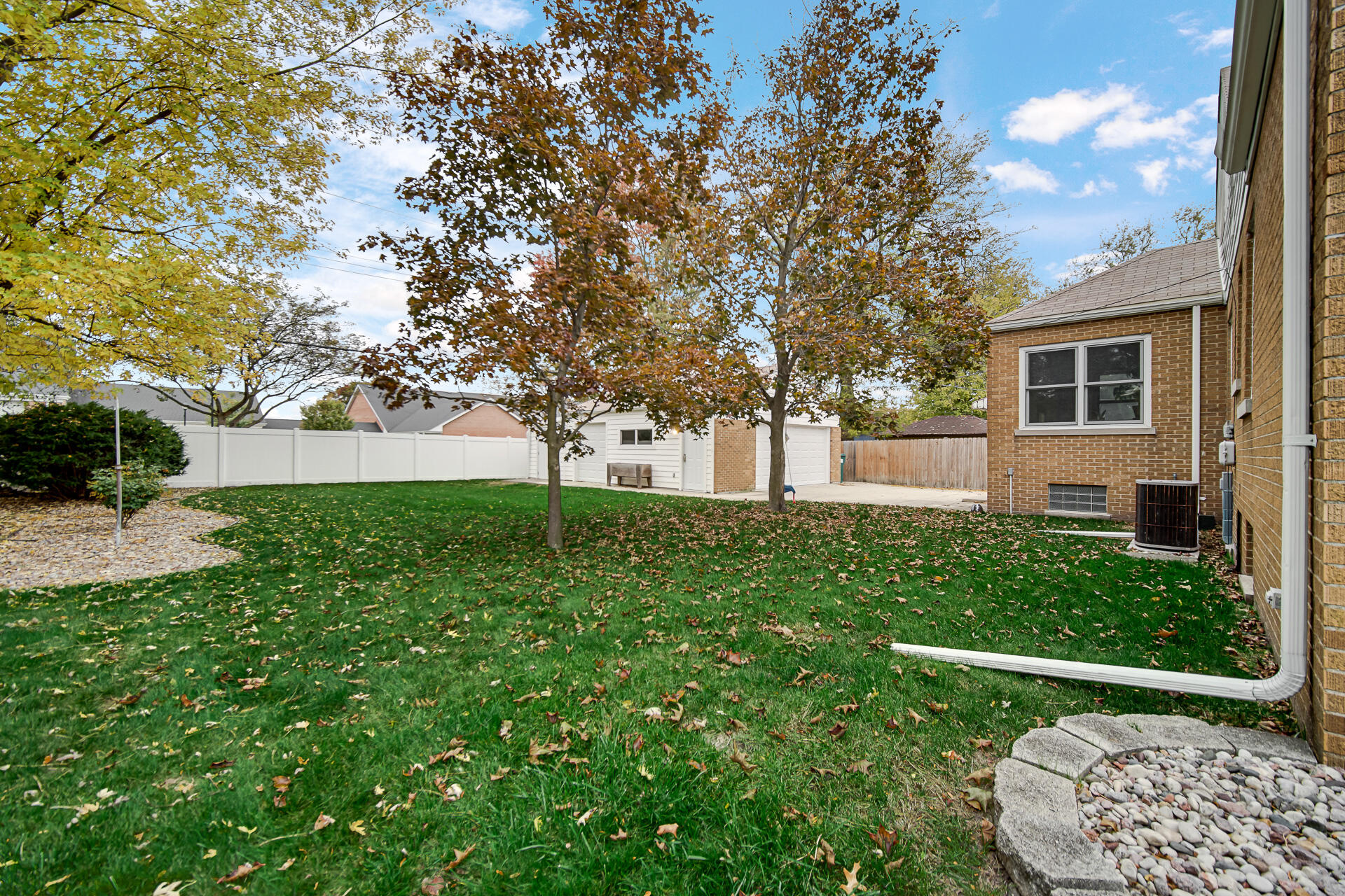 8342 Howard Avenue Munster, IN 46321 - Photo 27 of 31 a front view of a house with a yard