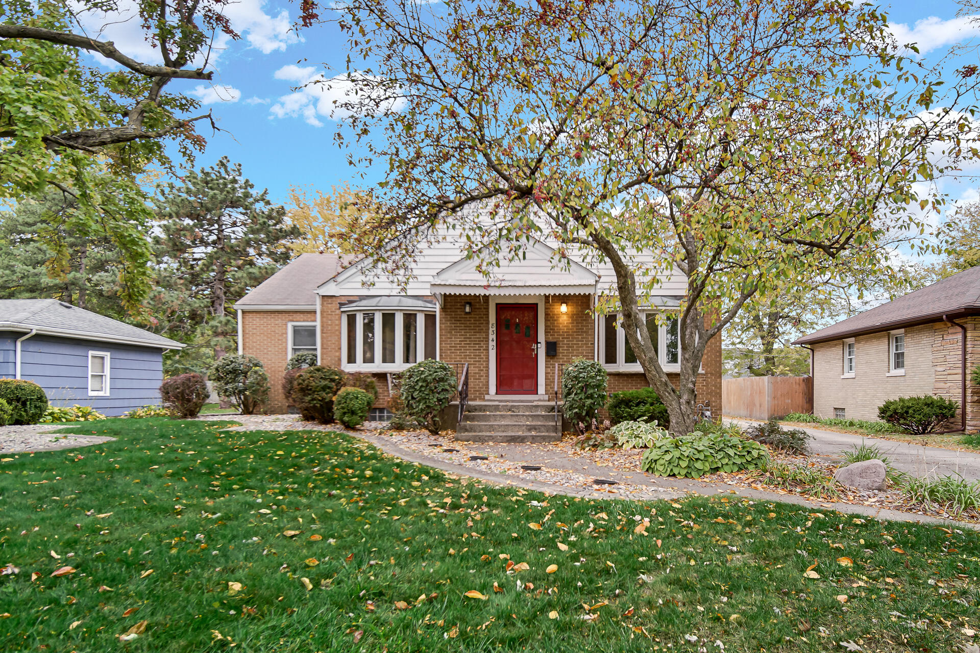 8342 Howard Avenue Munster, IN 46321 - Photo 30 of 31 a front view of a house with yard and green space