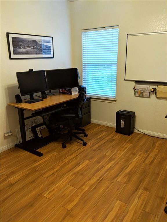 5501 Duval Street, Unit B Austin, TX 78751 - Photo 9 of 12 a living room with a couch and a coffee table
