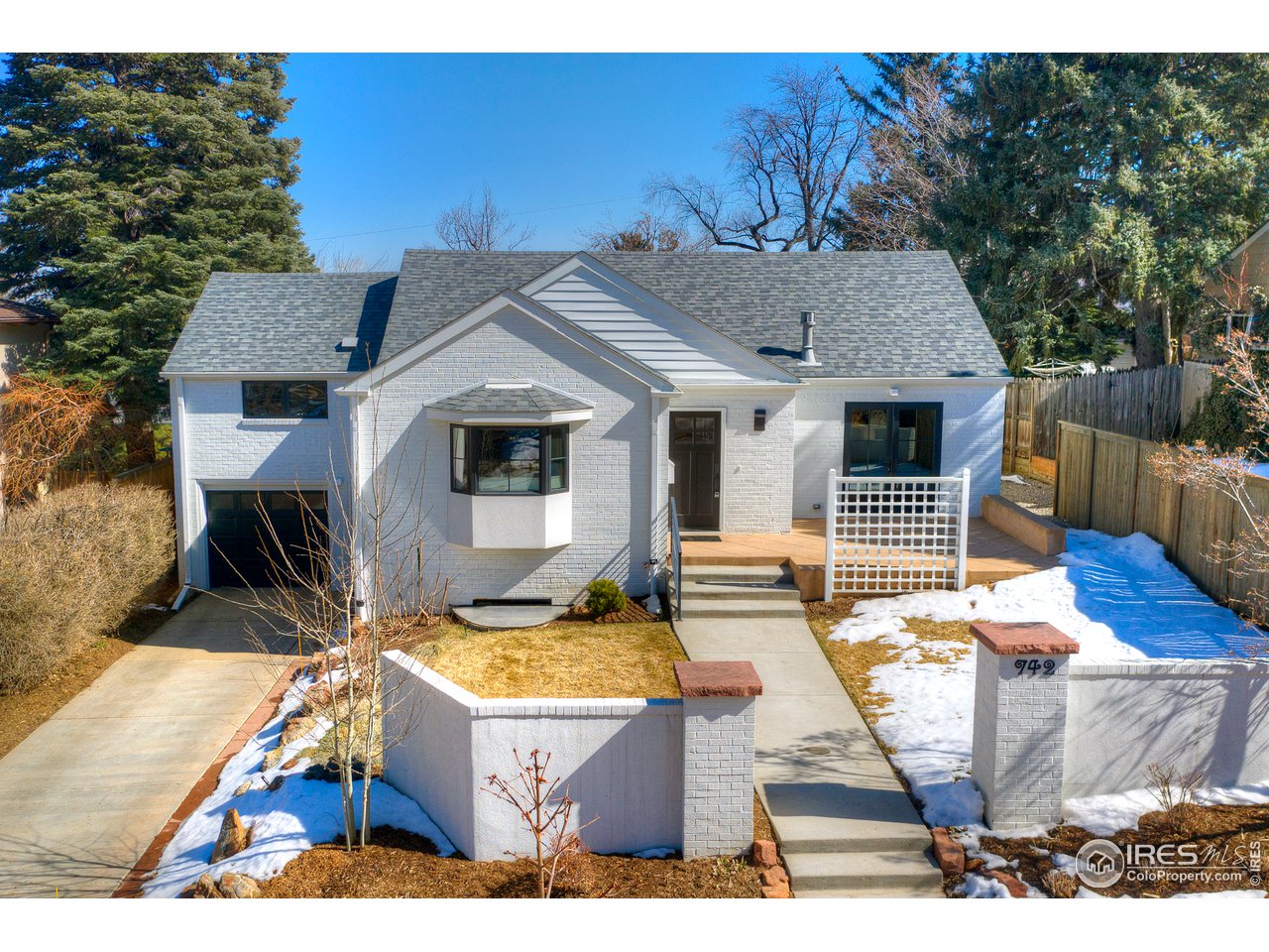 742 8th Street Boulder, CO 80302 - Photo 2 of 37 a view of a house with backyard porch and furniture