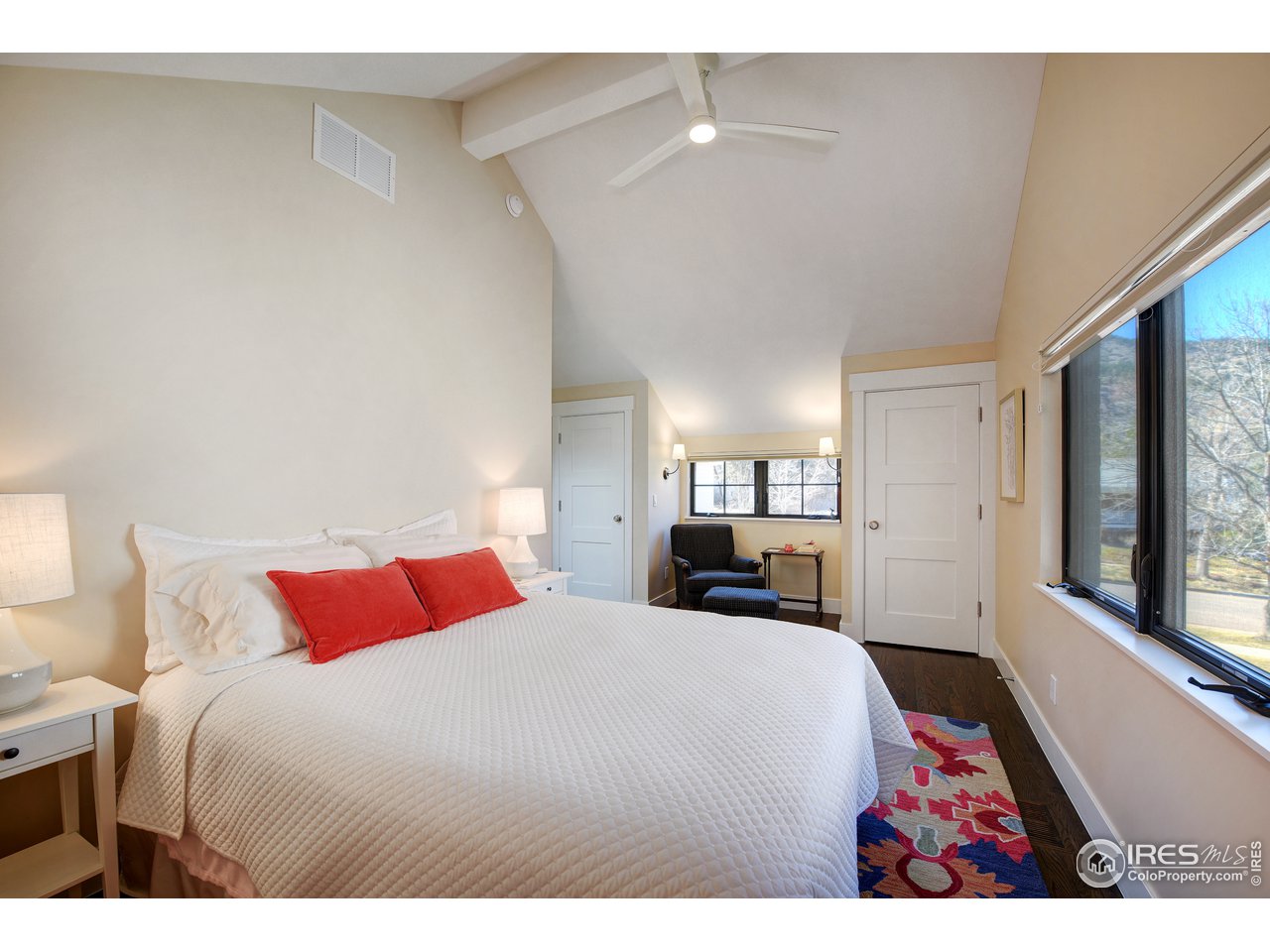 742 8th Street Boulder, CO 80302 - Photo 21 of 37 a bedroom with a large bed and a large window