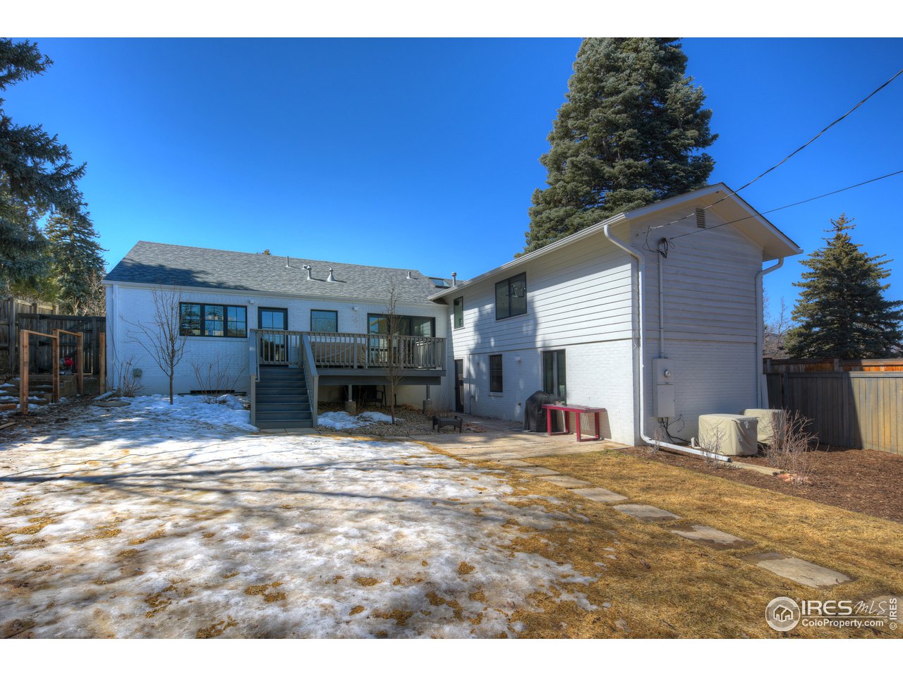 742 8th Street Boulder, CO 80302 - Photo 32 of 37 a view of a house with a patio