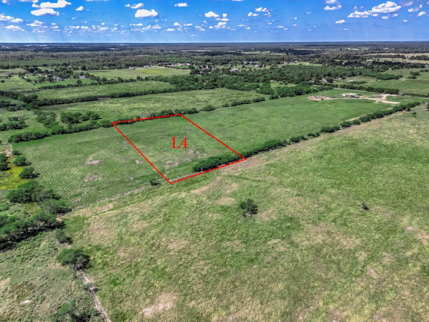 13927 Routt Point Road Needville, TX 77461 - Photo 7 of 9 Aerial view highlighting Lot 4, showcasing a 5-acre homesite with open space, surrounding acreage, and a sense of privacy within the subdivision.