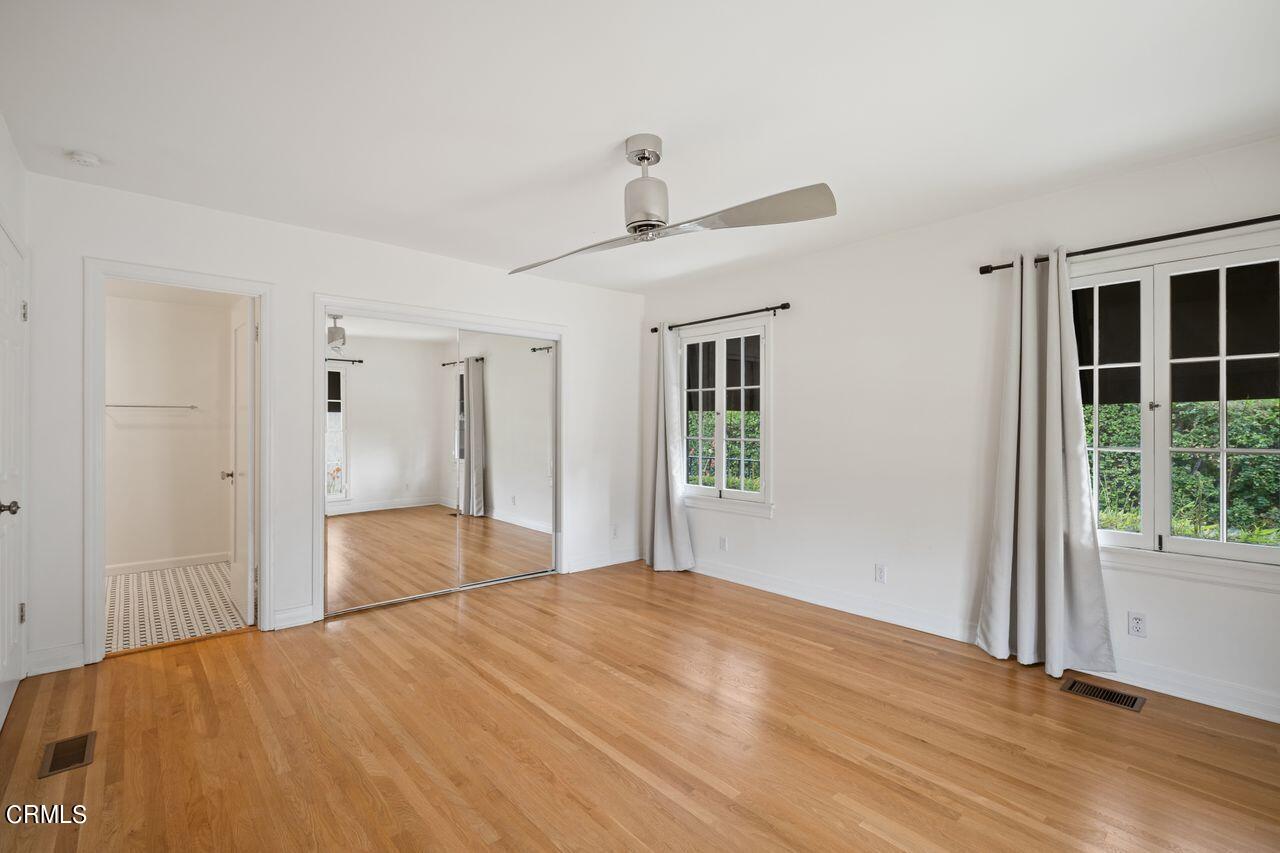 2107 Minoru Drive Altadena, CA 91001 - Photo 16 of 29 a bedroom with a bed and a window