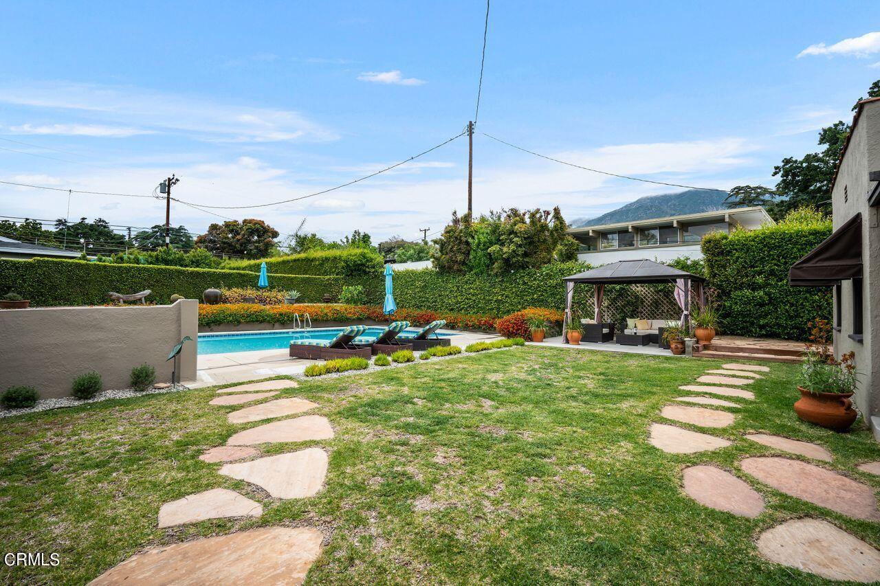 2107 Minoru Drive Altadena, CA 91001 - Photo 21 of 29 a view of a swimming pool with a patio