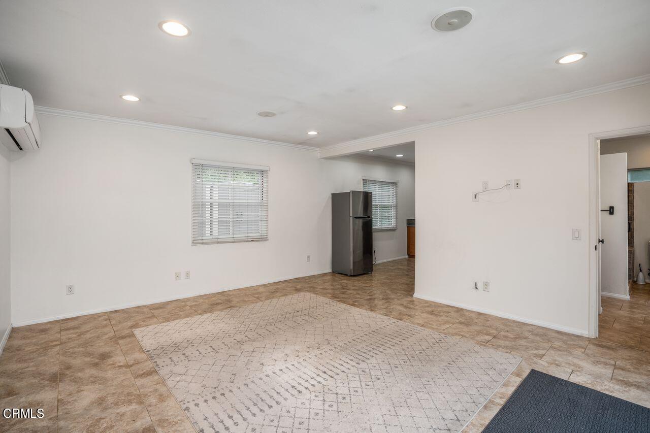 2107 Minoru Drive Altadena, CA 91001 - Photo 27 of 29 an empty room with an entryway and kitchen