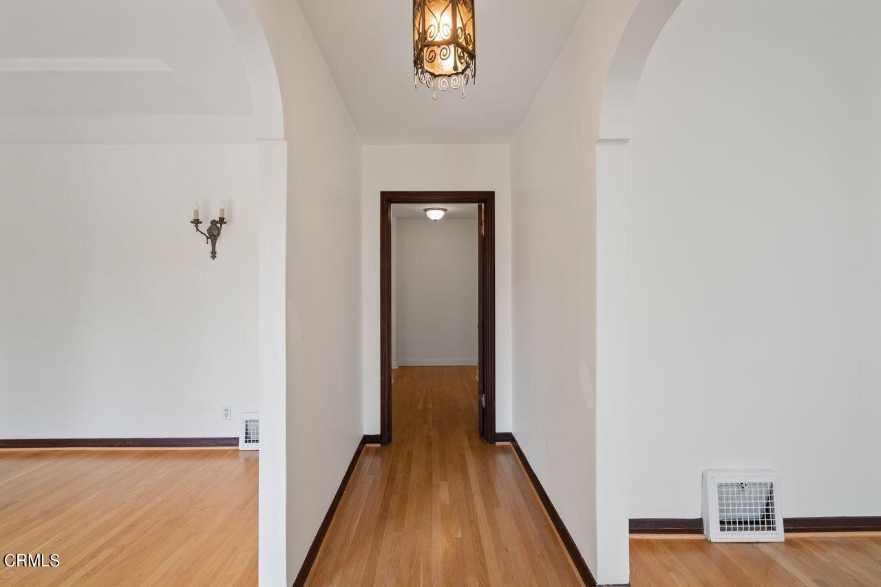 2107 Minoru Drive Altadena, CA 91001 - Photo 5 of 29 a view of a hallway with wooden floor and closet
