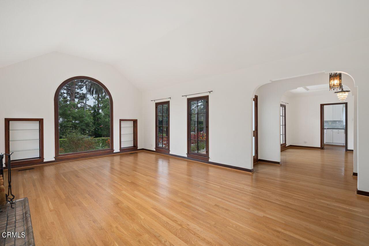 2107 Minoru Drive Altadena, CA 91001 - Photo 7 of 29 a view of an empty room with window wooden floor and windows