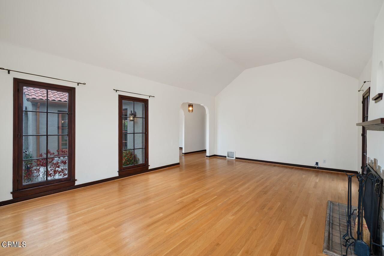 2107 Minoru Drive Altadena, CA 91001 - Photo 8 of 29 an empty room with wooden floor and windows