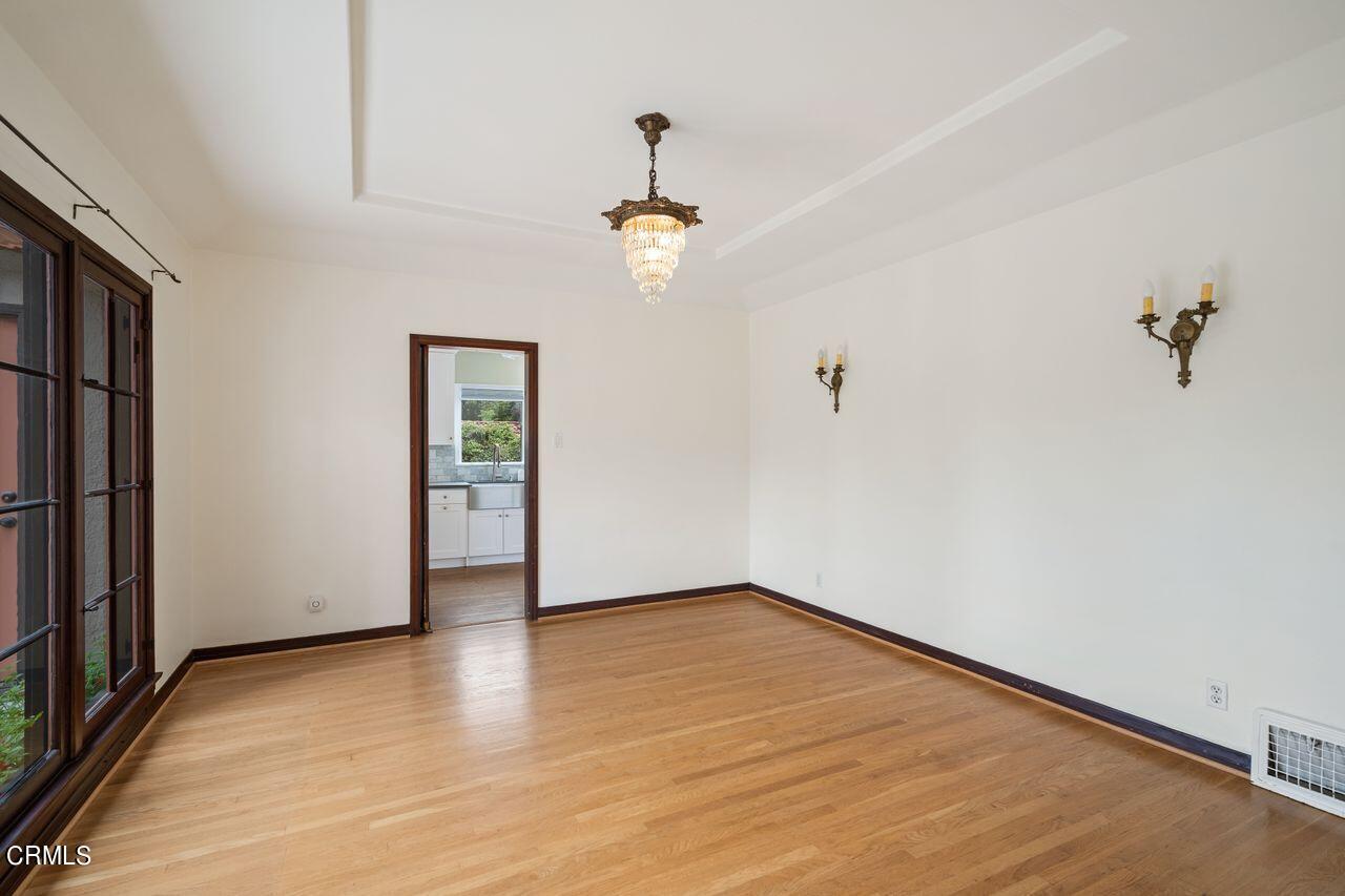 2107 Minoru Drive Altadena, CA 91001 - Photo 9 of 29 wooden floor in an empty room with a window