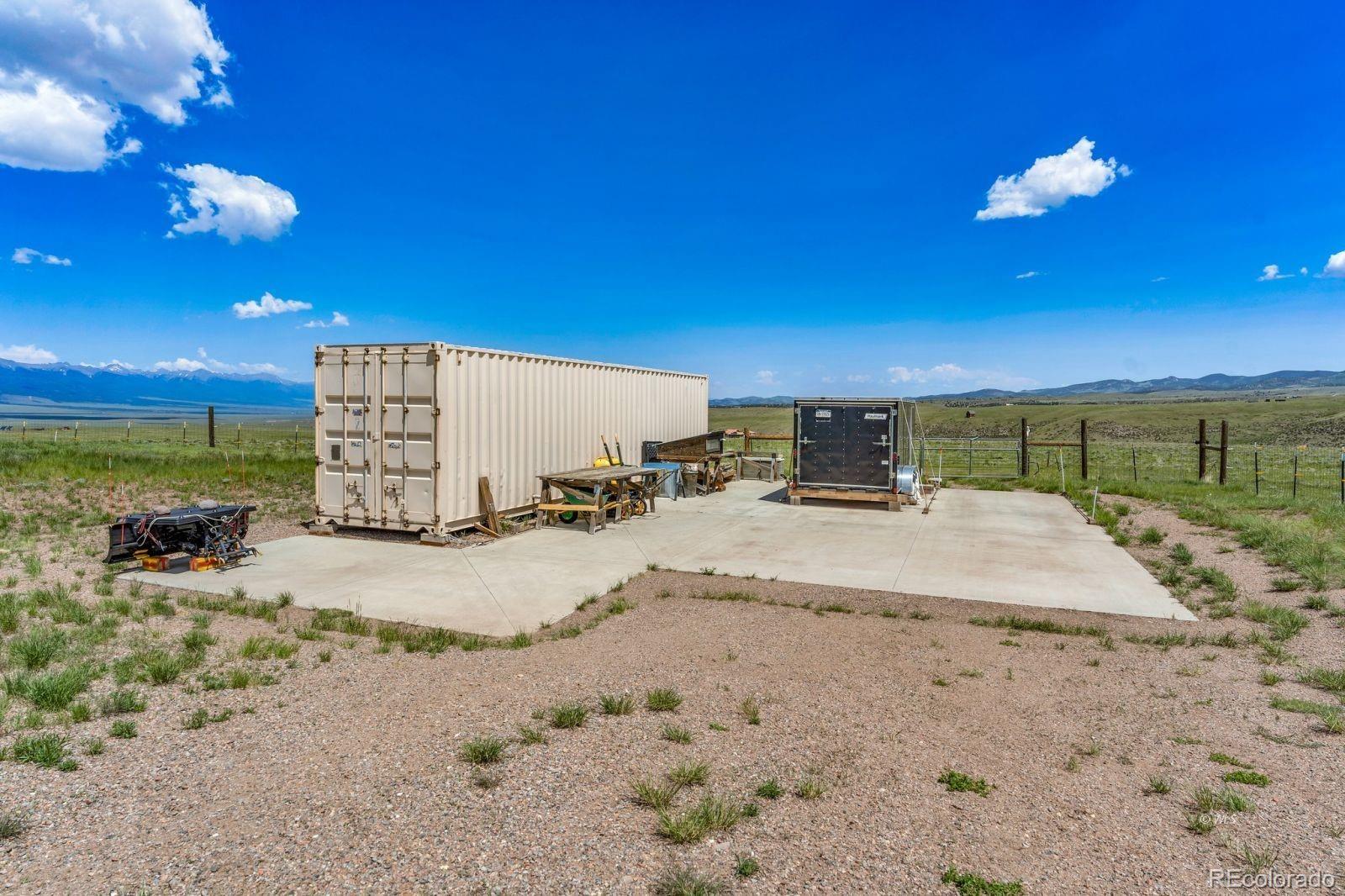 535 Brittany Road Westcliffe, CO 81252 - Photo 26 of 31 a view of a backyard of the house