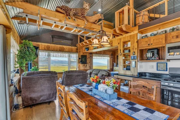 a outdoor living space with furniture and a fireplace