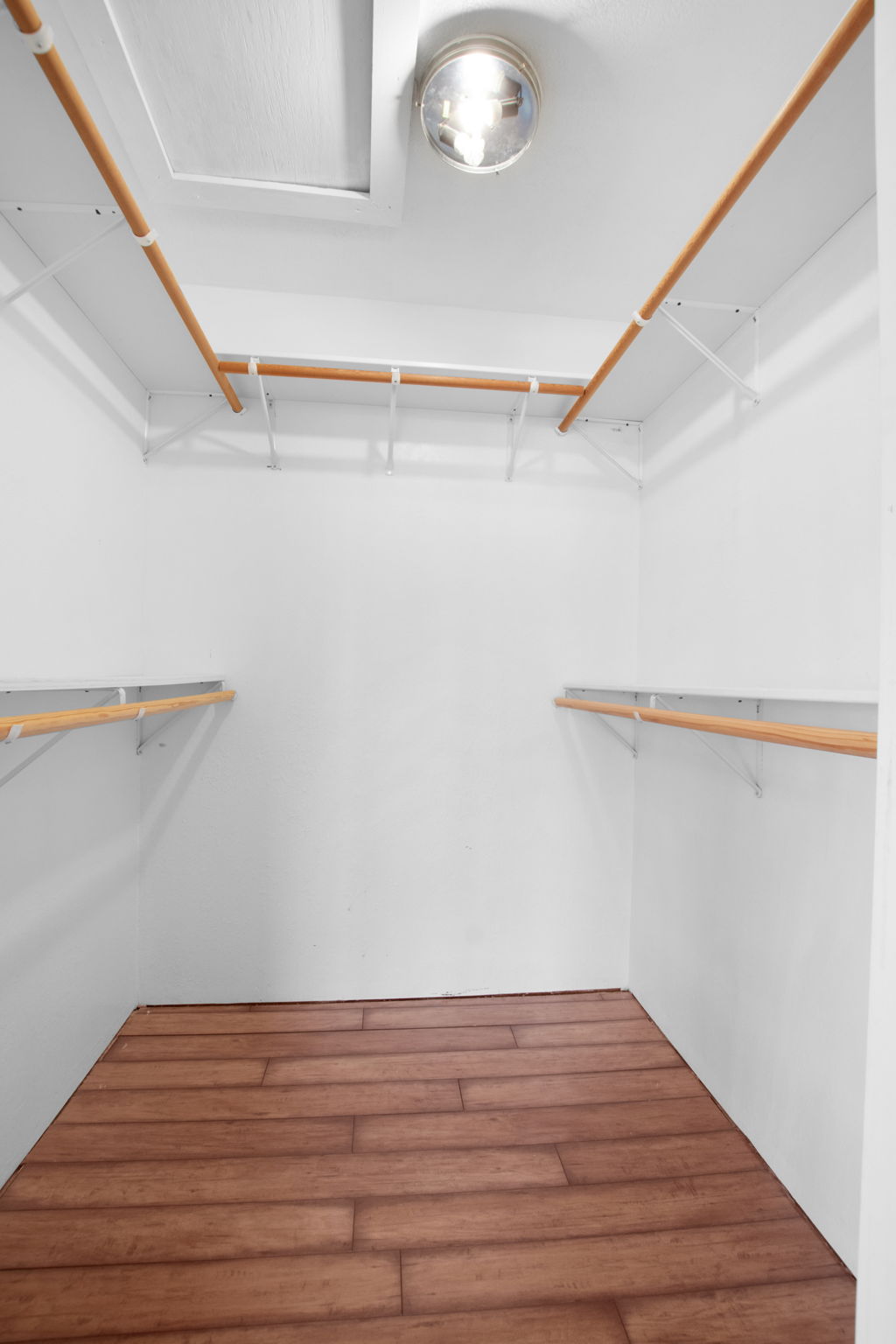 112 Frazier Tow, TX 78672 - Photo 13 of 30 Spacious closet with wood finished floors