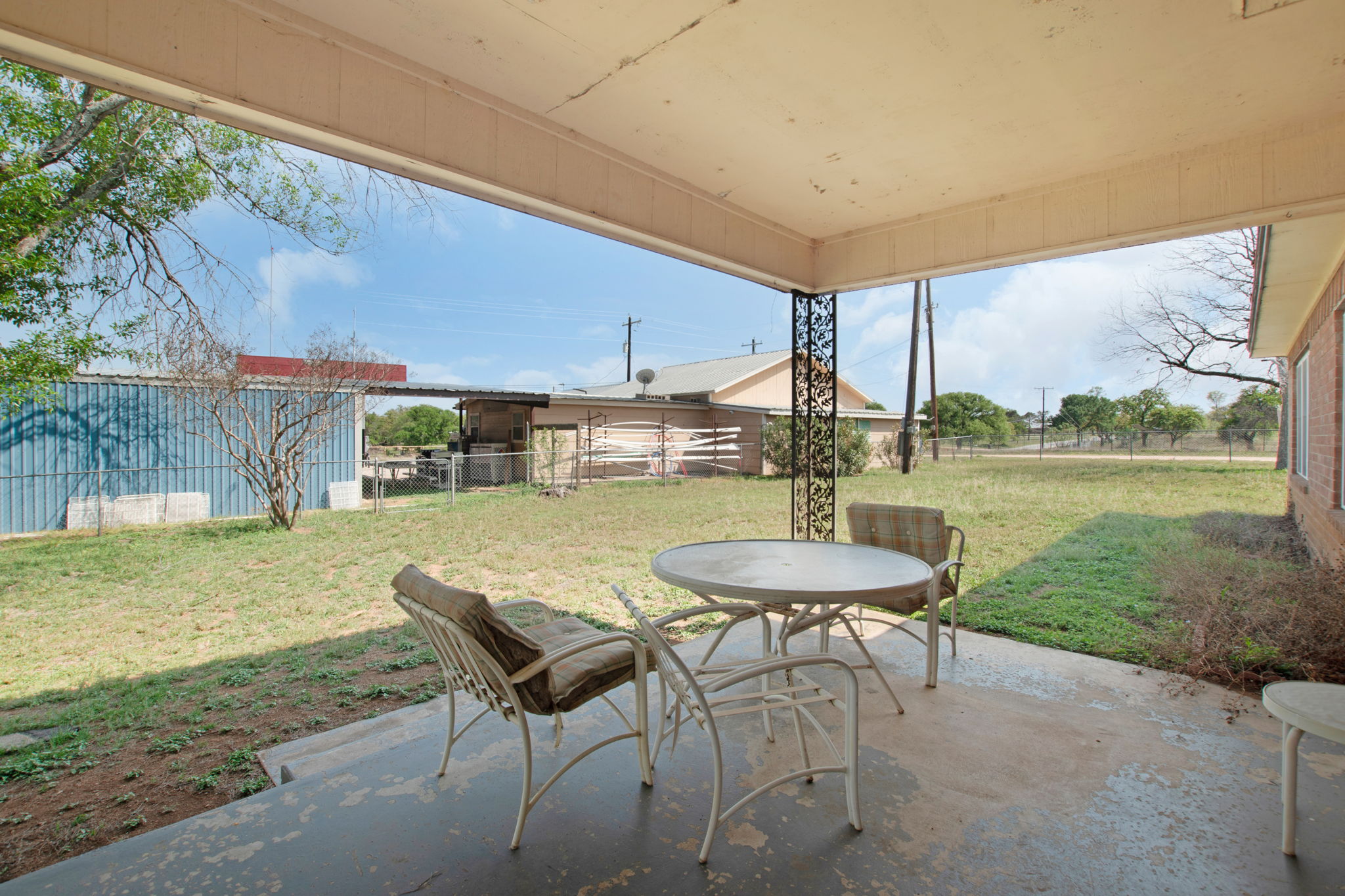 112 Frazier Tow, TX 78672 - Photo 19 of 30 View of patio featuring outdoor dining space and fence