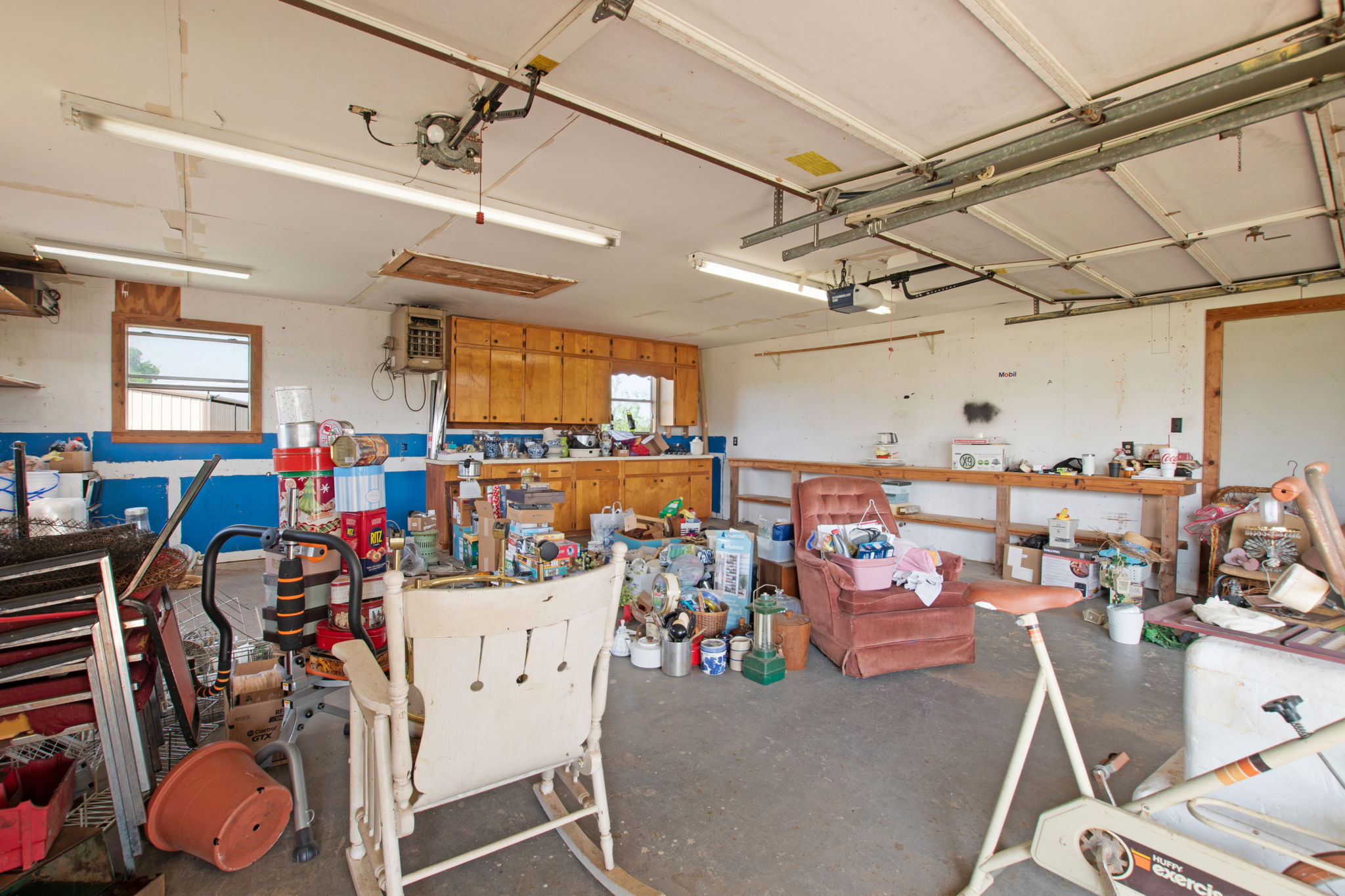 112 Frazier Tow, TX 78672 - Photo 20 of 30 Garage with a garage door opener and a workshop area