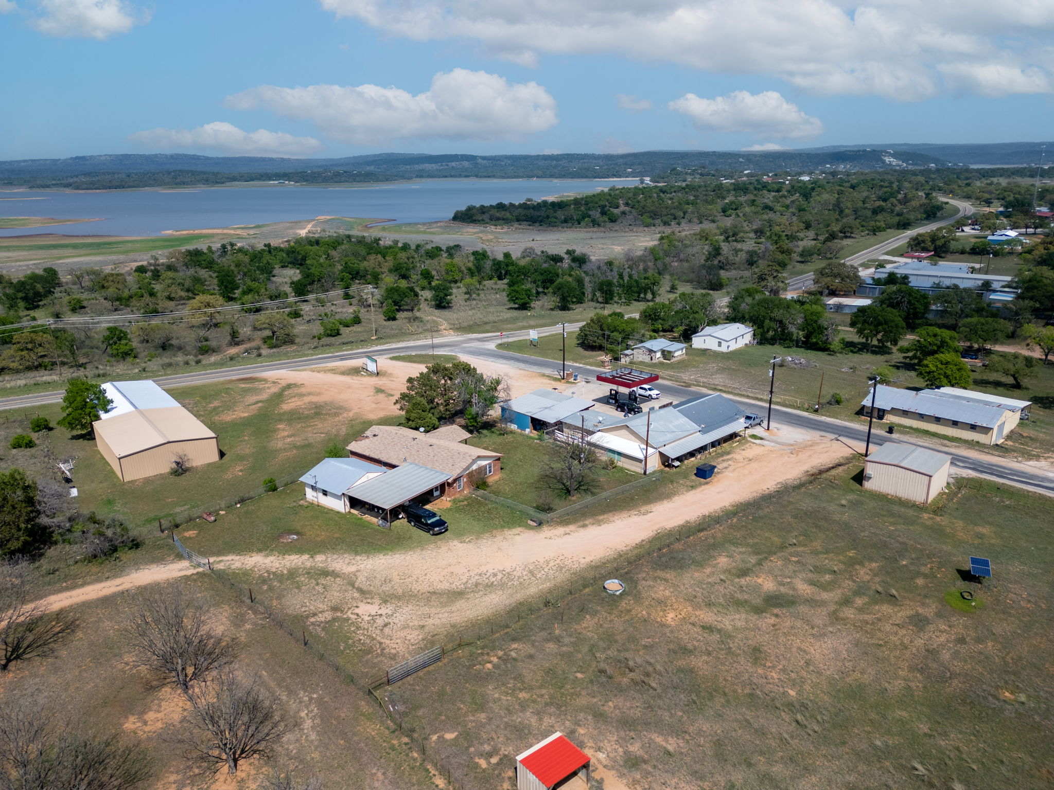 112 Frazier Tow, TX 78672 - Photo 24 of 30 Drone / aerial view with a water view