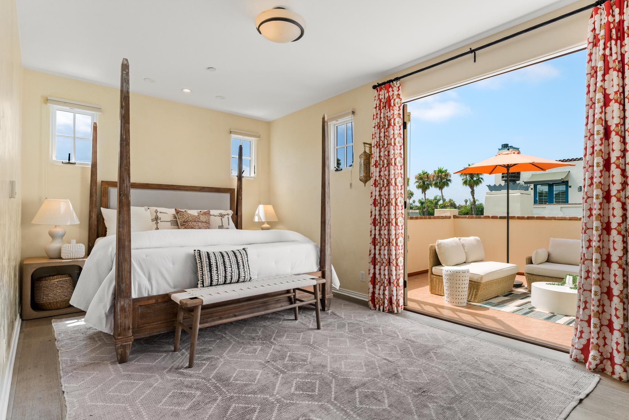 212 Santa Barbara Street, Unit B Santa Barbara, CA 93101 - Photo 14 of 28 a bed room with a bed and a chair