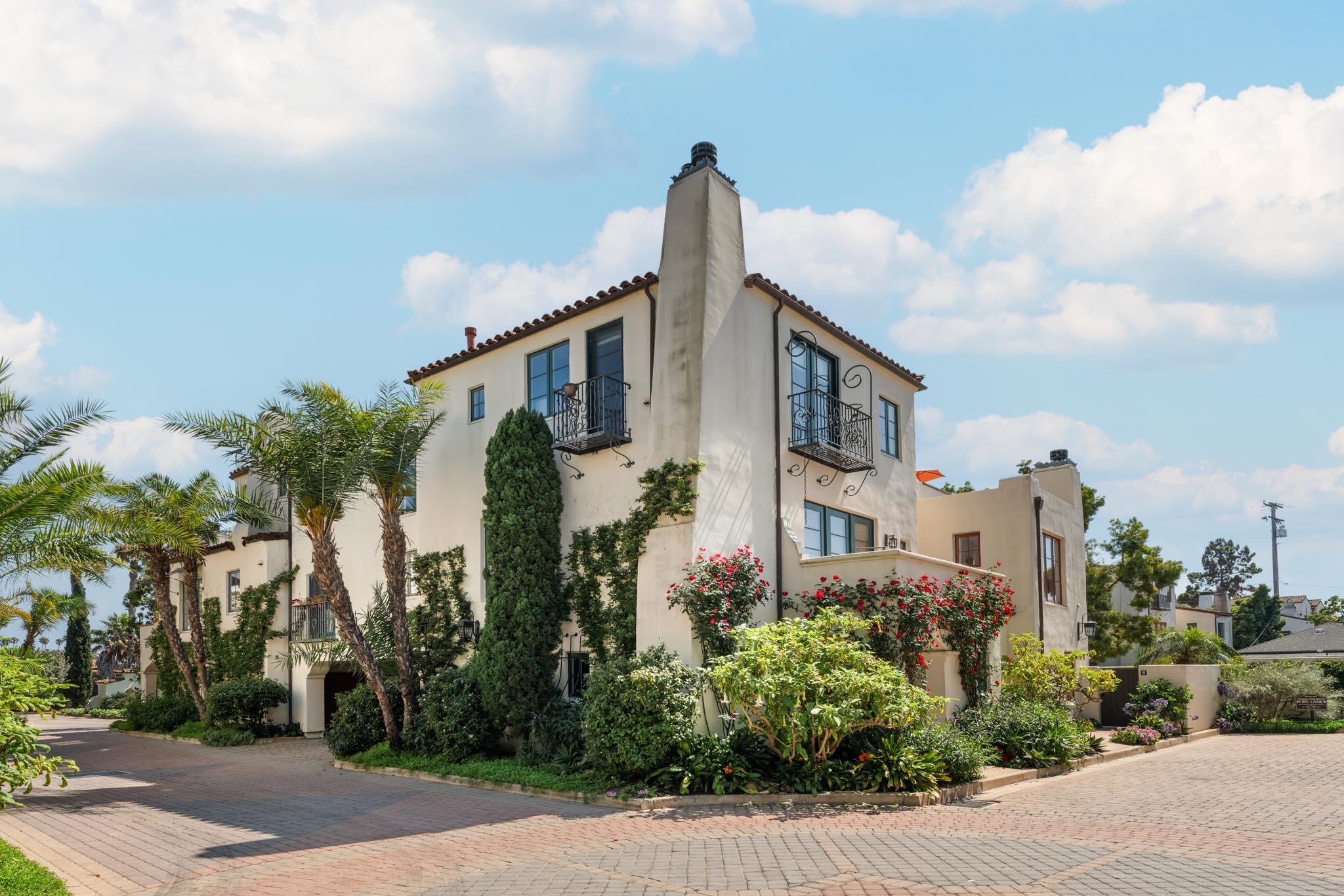 212 Santa Barbara Street, Unit B Santa Barbara, CA 93101 - Photo 2 of 28 a front view of a house with a yard and potted plants