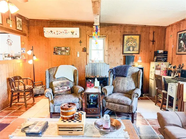 a living room with furniture and a couch