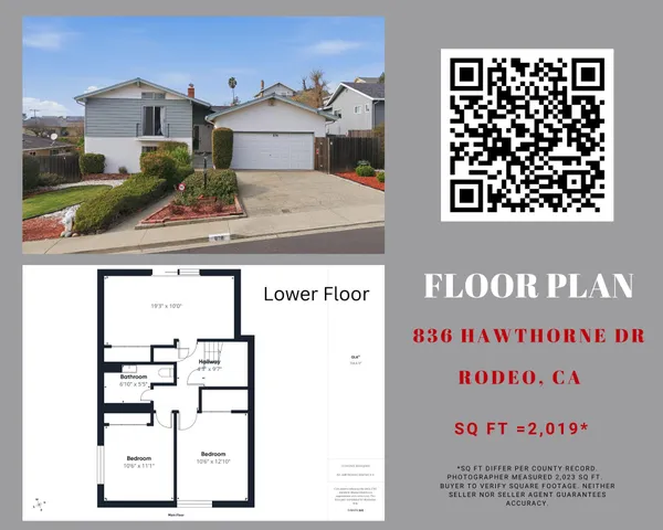 a sign that is sitting in front of flowers