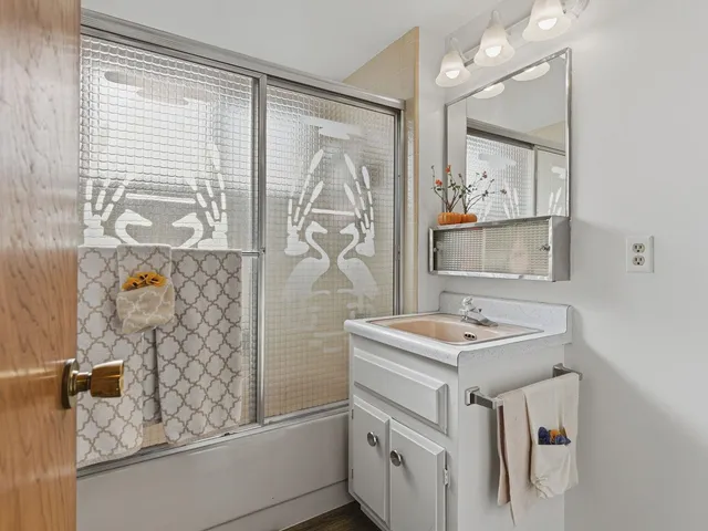 a view of a chairs and table in patio