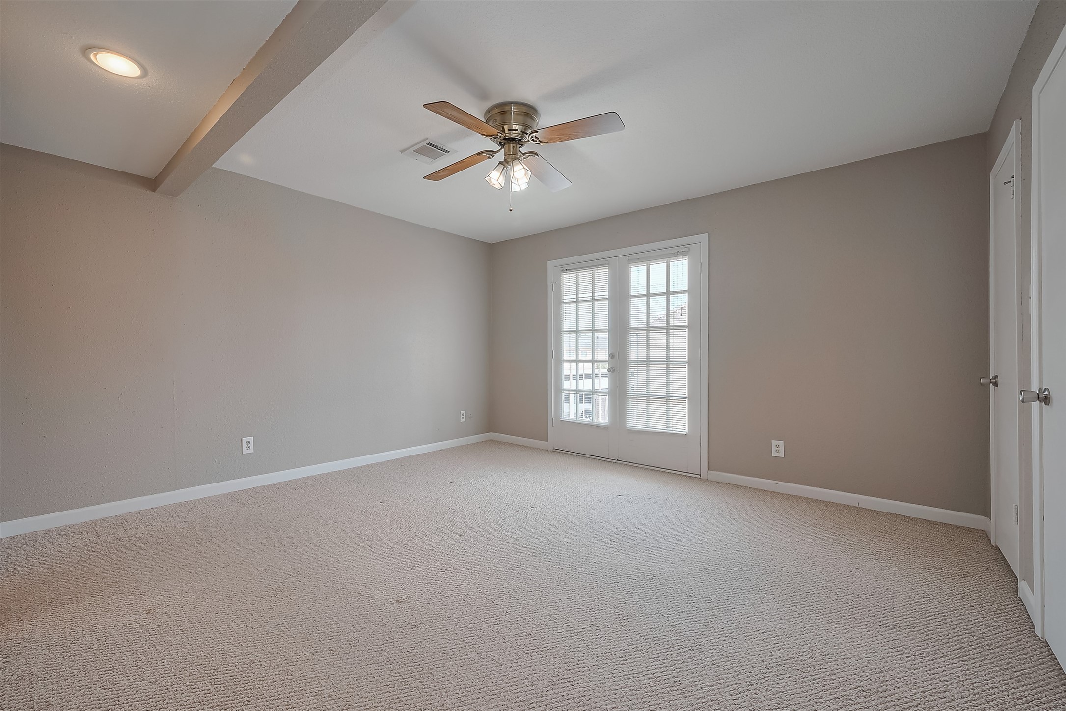 6111 Beverly Hill Street, Unit 29 Houston, TX 77057 - Photo 11 of 22 a view of an empty room with a window