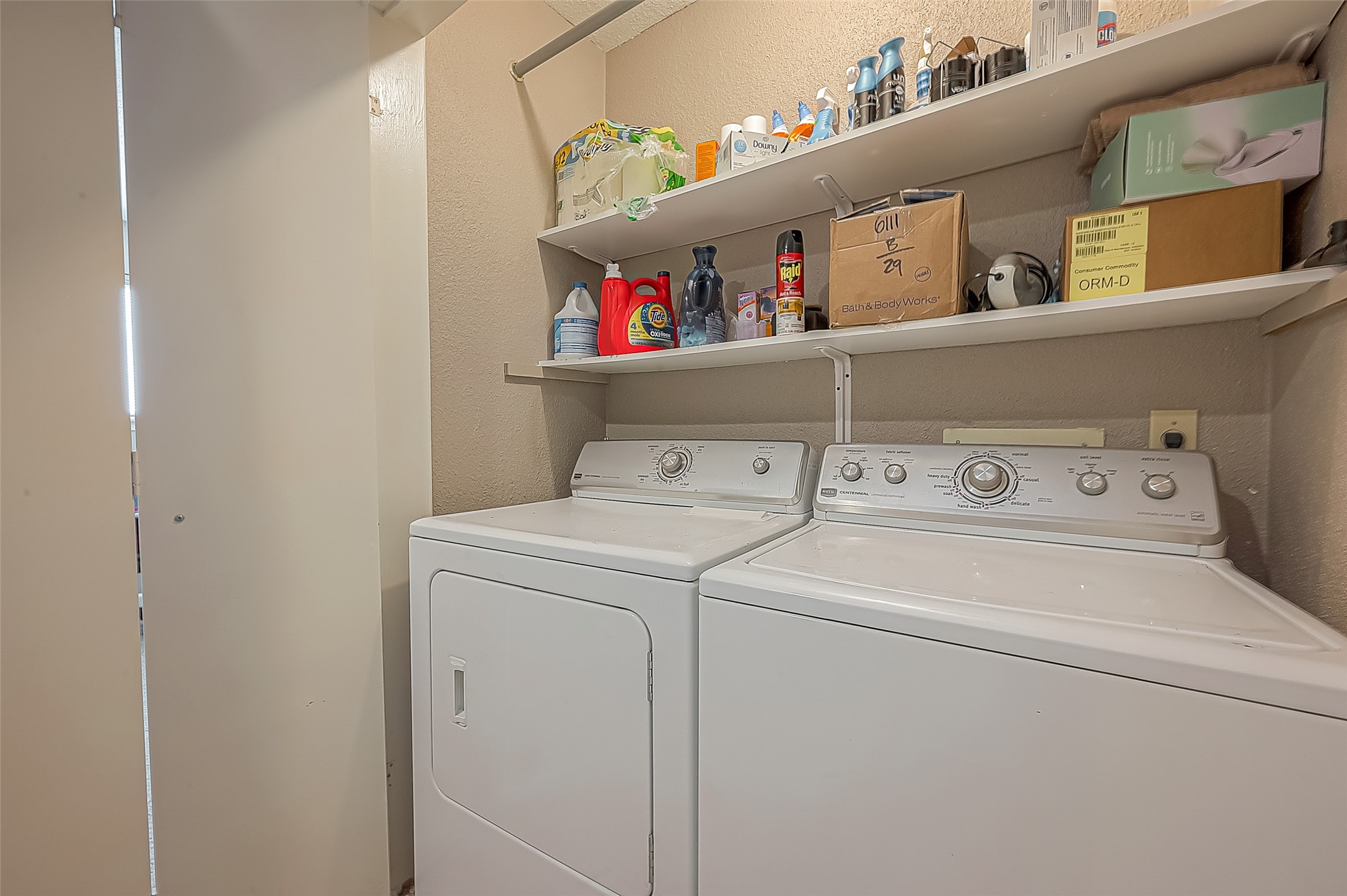 6111 Beverly Hill Street, Unit 29 Houston, TX 77057 - Photo 17 of 22 a utility room with dryer and washer