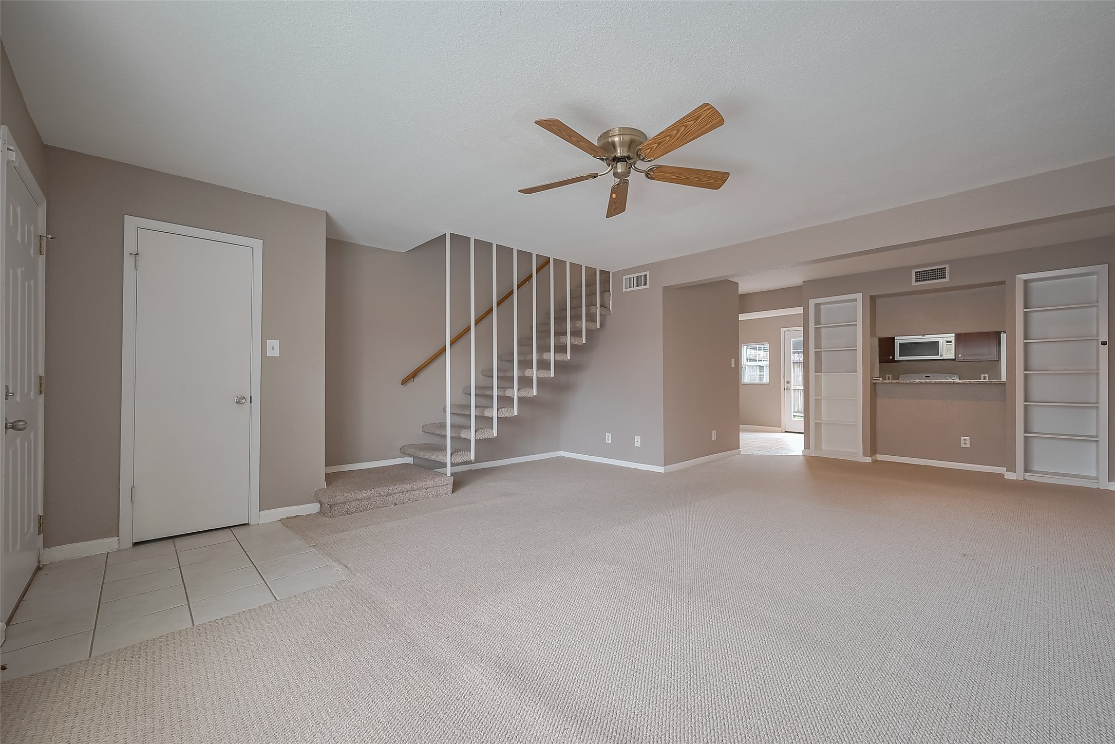 6111 Beverly Hill Street, Unit 29 Houston, TX 77057 - Photo 3 of 22 a view of an empty room with a window