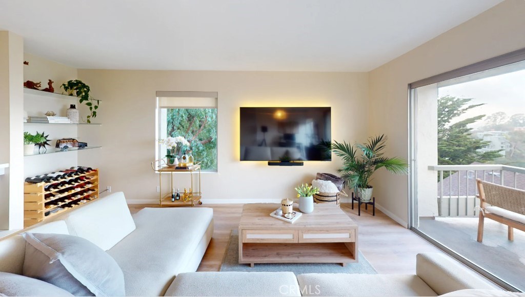 96 Anchorage Road Sausalito, CA 94965 - Photo 4 of 12 a living room with furniture and a flat screen tv
