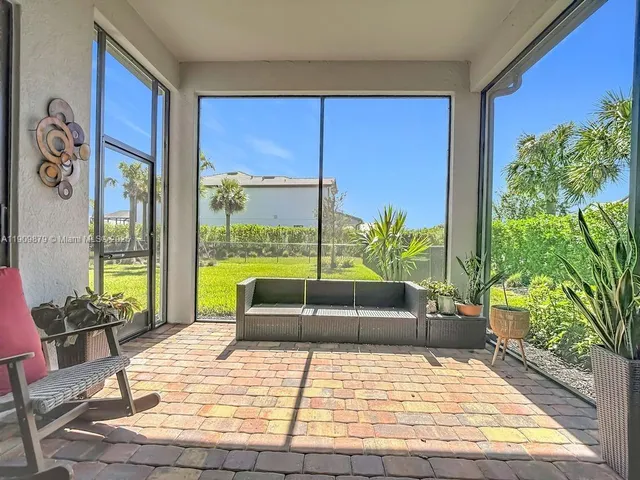 a room with balcony and furniture