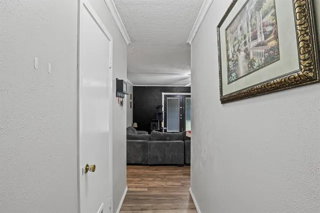 a view of a hallway and interior of the house