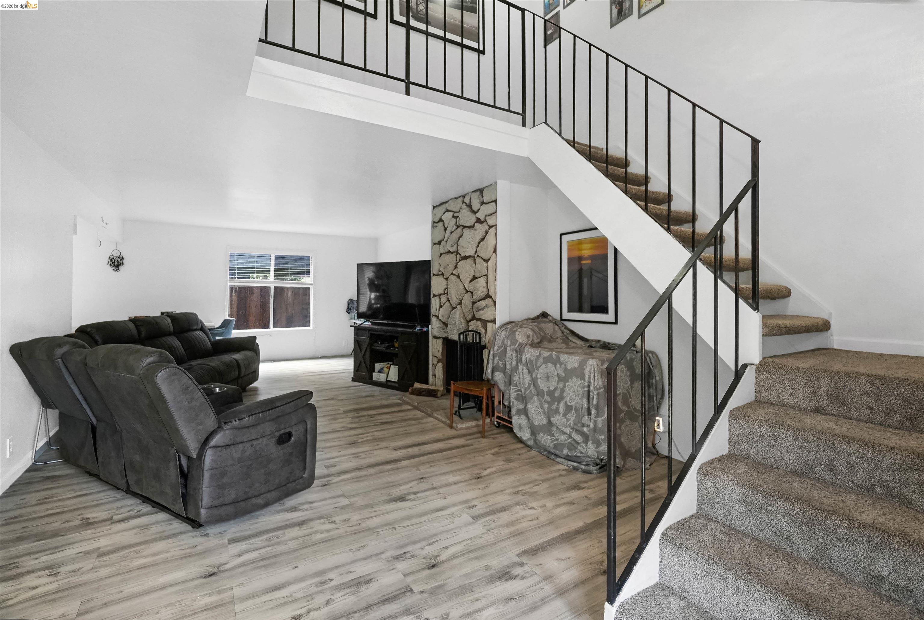 1066 San Miguel Road Concord, CA 94518 - Photo 12 of 59 Living area featuring light wood-style floors and a high ceiling