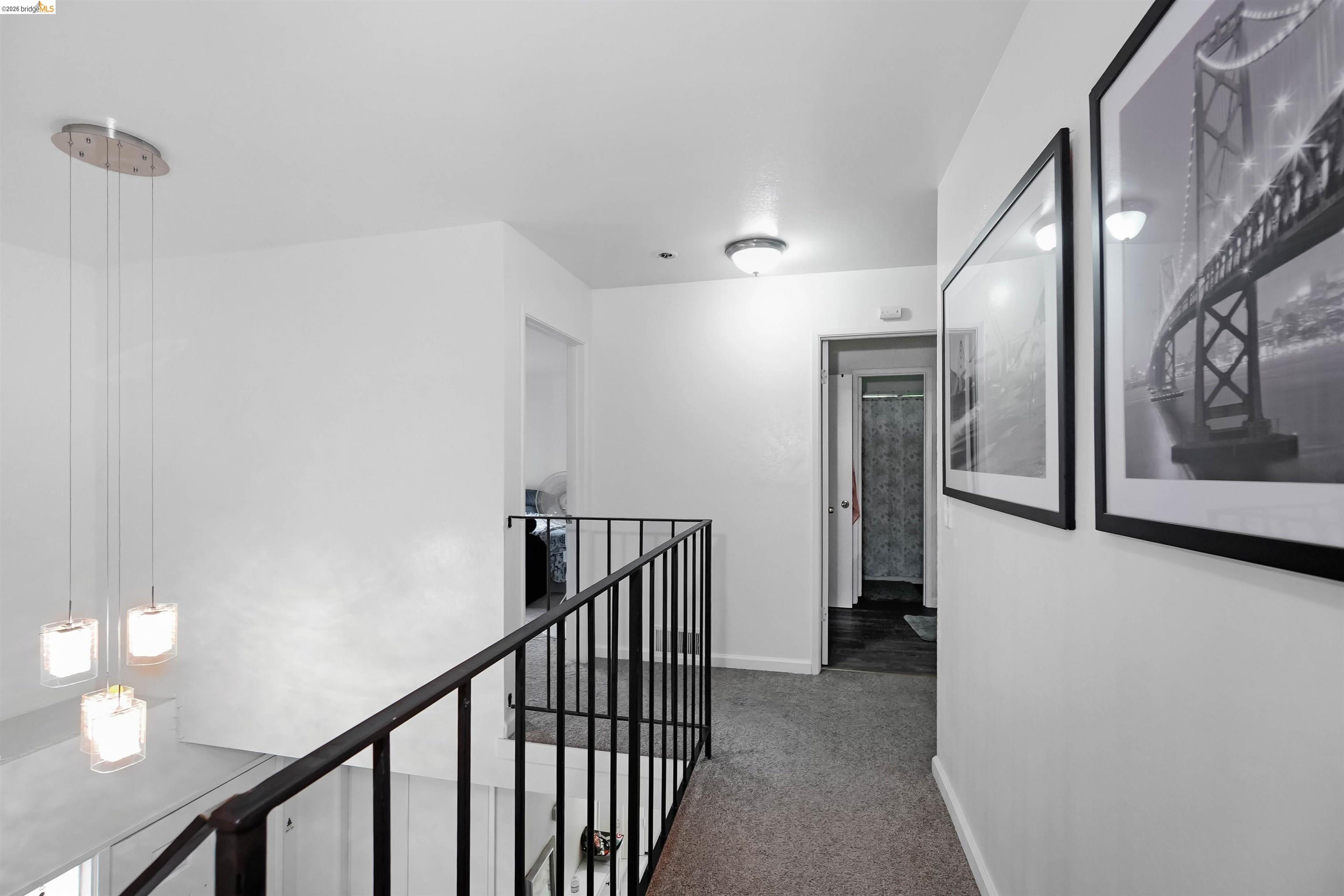 1066 San Miguel Road Concord, CA 94518 - Photo 24 of 59 Hallway featuring an upstairs landing and light carpet