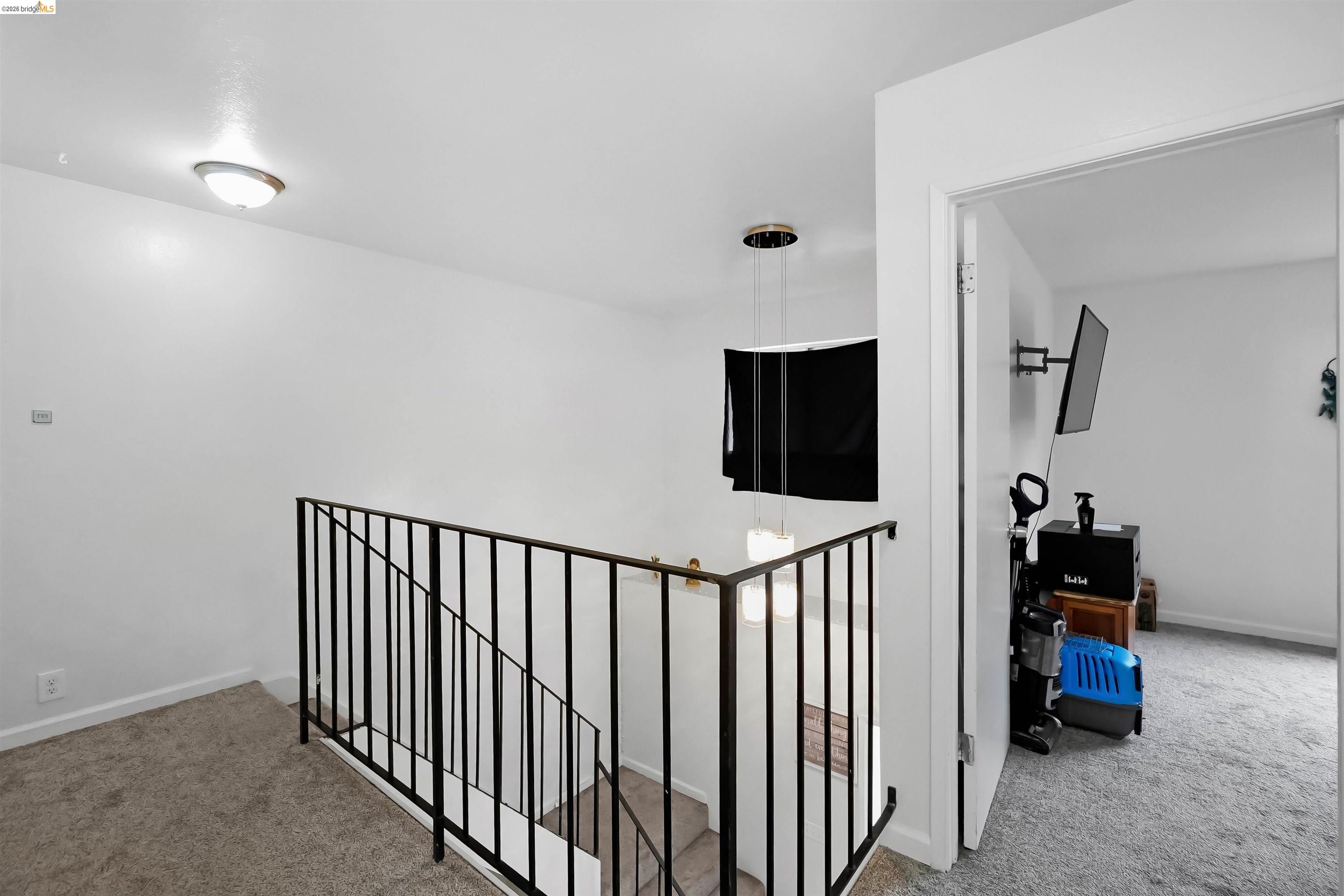 1066 San Miguel Road Concord, CA 94518 - Photo 25 of 59 Hall featuring carpet floors and an upstairs landing