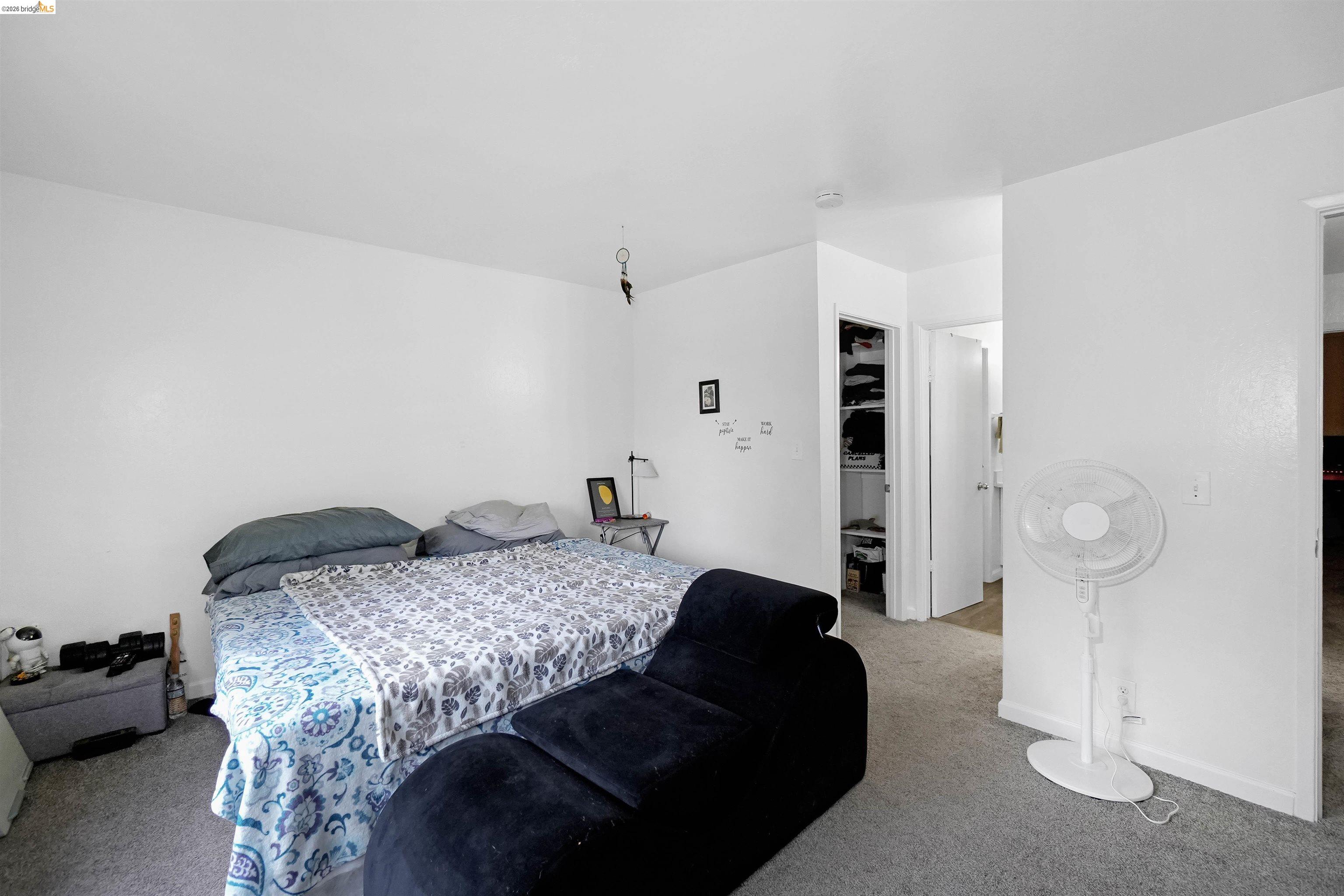 1066 San Miguel Road Concord, CA 94518 - Photo 26 of 59 Bedroom with light colored carpet and a spacious closet