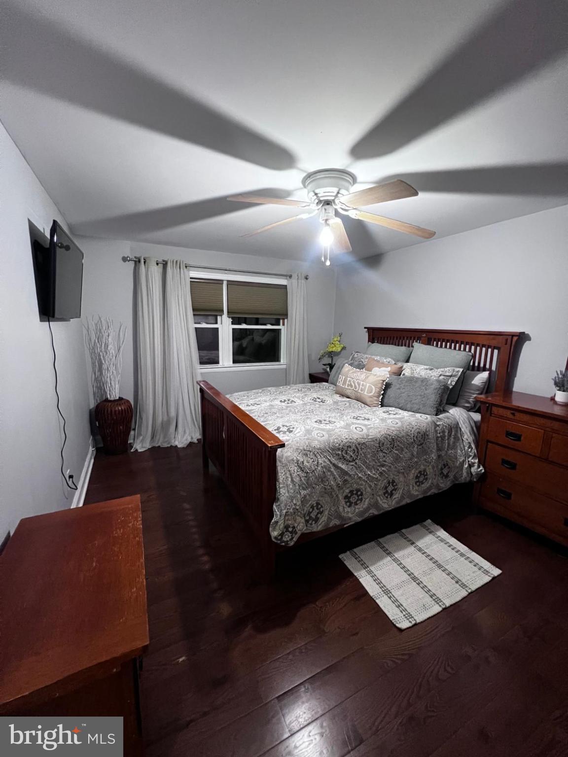 12715 Cabell Road Philadelphia, PA 19154 - Photo 12 of 33 Cozy bedroom with warm wooden accents.