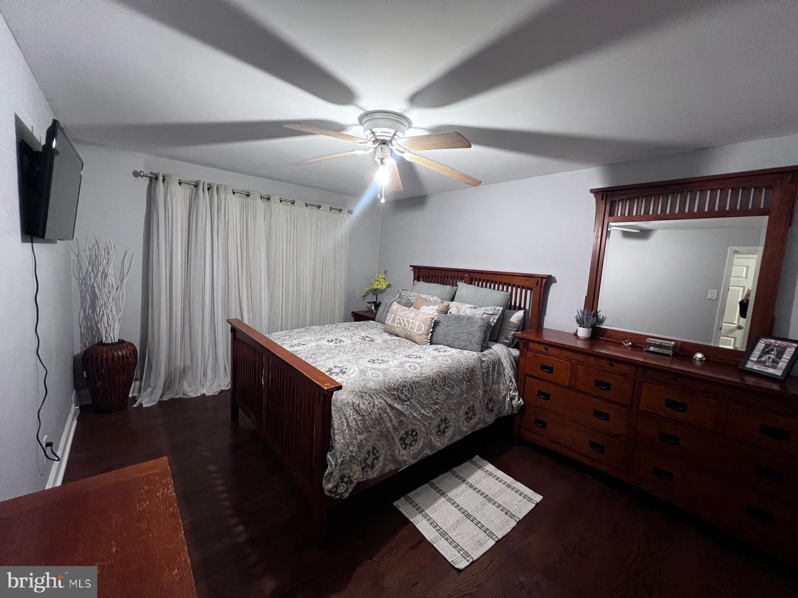 12715 Cabell Road Philadelphia, PA 19154 - Photo 15 of 33 Cozy bedroom with elegant wooden accents.