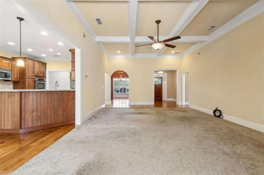 94 Appalachee Church Road Auburn, GA 30011 - Photo 20 of 66 a view of an empty room with a kitchen