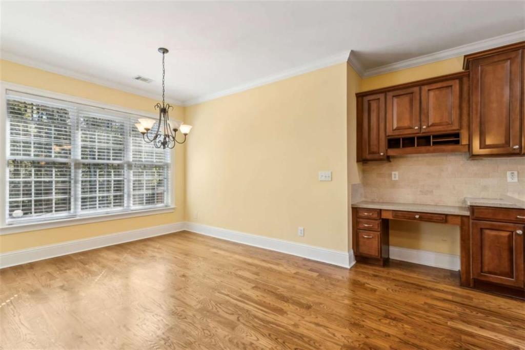 94 Appalachee Church Road Auburn, GA 30011 - Photo 29 of 66 a view of an empty room with window and wooden floor