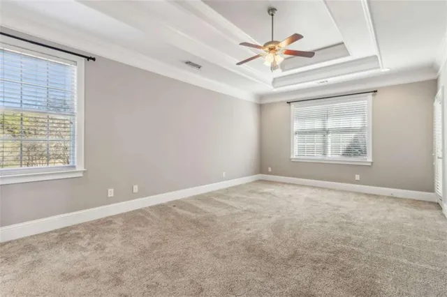 a bathroom with a tub sink shower and mirror