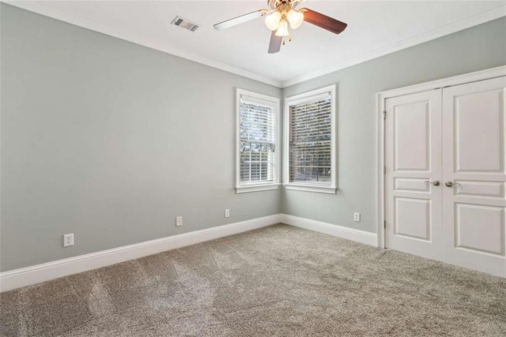 94 Appalachee Church Road Auburn, GA 30011 - Photo 41 of 66 a view of an empty room with a window