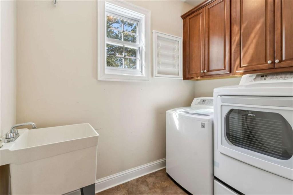 94 Appalachee Church Road Auburn, GA 30011 - Photo 48 of 66 a utility room with dryer and washer