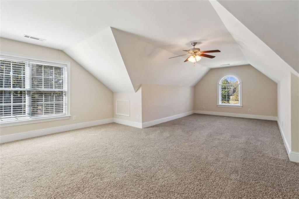 94 Appalachee Church Road Auburn, GA 30011 - Photo 50 of 66 an empty room with windows and ceiling fan