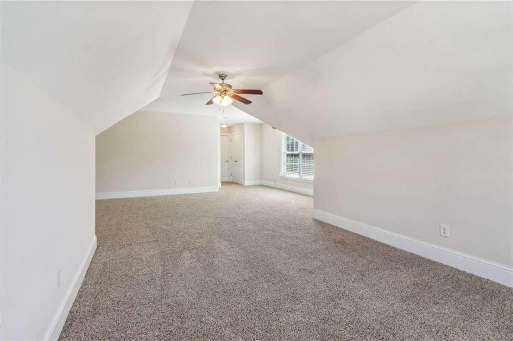94 Appalachee Church Road Auburn, GA 30011 - Photo 51 of 66 a view of empty room with a ceiling fan