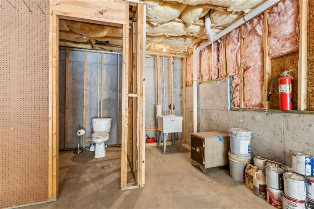 94 Appalachee Church Road Auburn, GA 30011 - Photo 56 of 66 a bathroom with a sink and a mirror