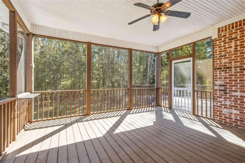 94 Appalachee Church Road Auburn, GA 30011 - Photo 60 of 66 a view of a room with wooden floor and windows