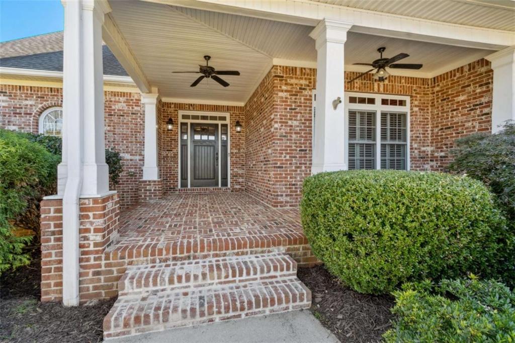 94 Appalachee Church Road Auburn, GA 30011 - Photo 7 of 66 a front view of a house with a garden