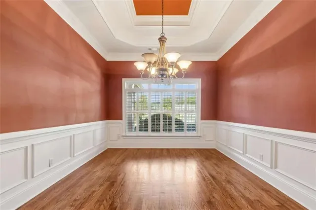 a view of a livingroom with wooden floor